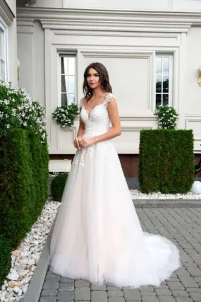 ---Glorious wedding dress for all ages with a flattering fit and a flared silhouette with a deep V-neckline--