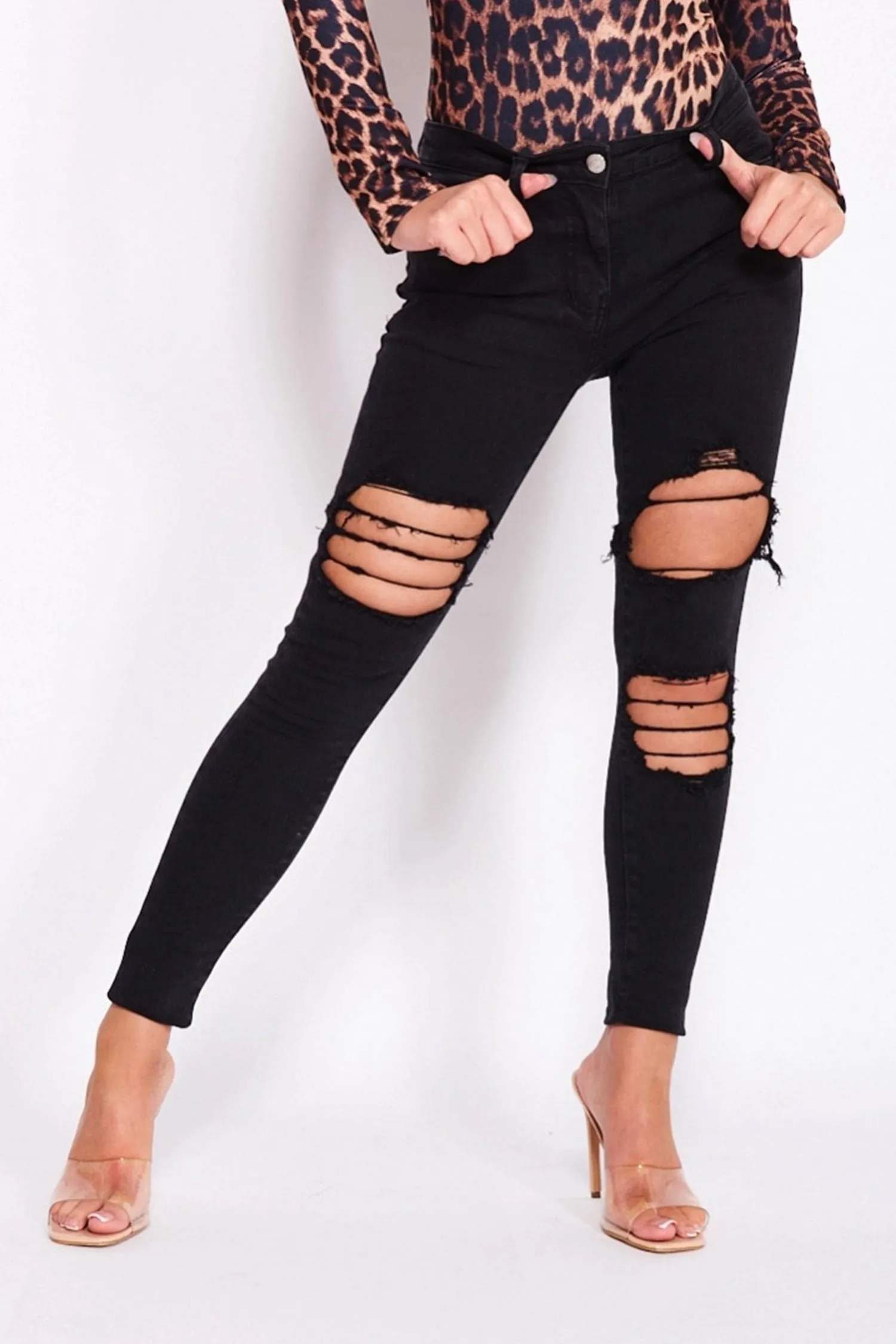 Pantalone jeans skinny nero con strappi